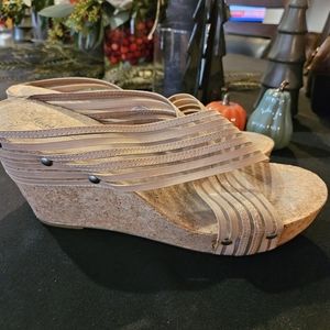 Lucky brand light weight tan color sandals. Criss cross looks. 4 inch heels